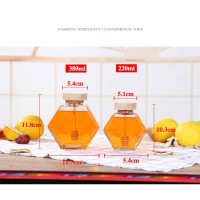 Wholesale Flat Transparent Glass Honey Jar Jam Bottle With Wooden Lid Hexagon Sealed Glass Honey Jar With Stirring Rod